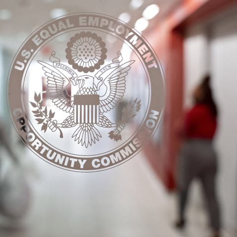 The Equal Employment Opportunity Commission seal on a window at the headquarters in Washington, D.C.