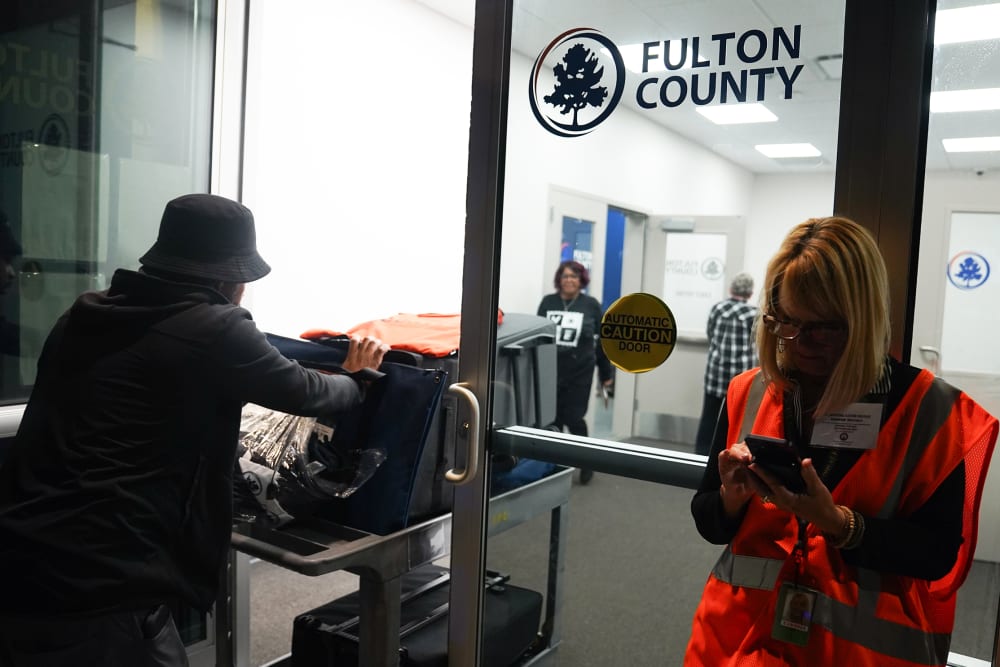 Ballots arrive at the Fulton County Elections Hub and Operation Center on Nov. 5, 2024 in Fairburn, Ga.