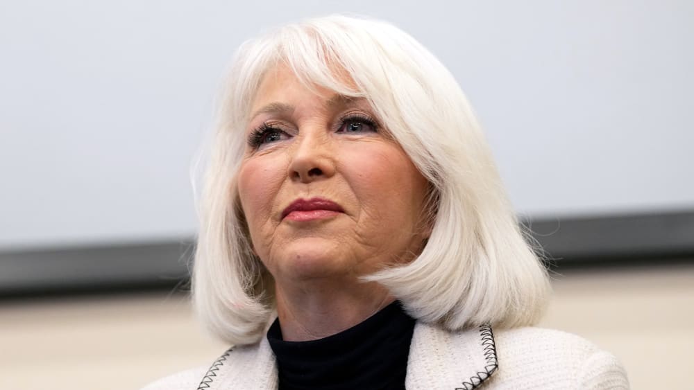 Tina Peters speaks during a debate for the state leadership position.