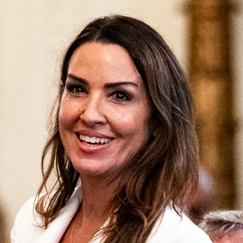 Sara Carter during a bill-signing ceremony on July 16, 2025, in the East Room of the White House.