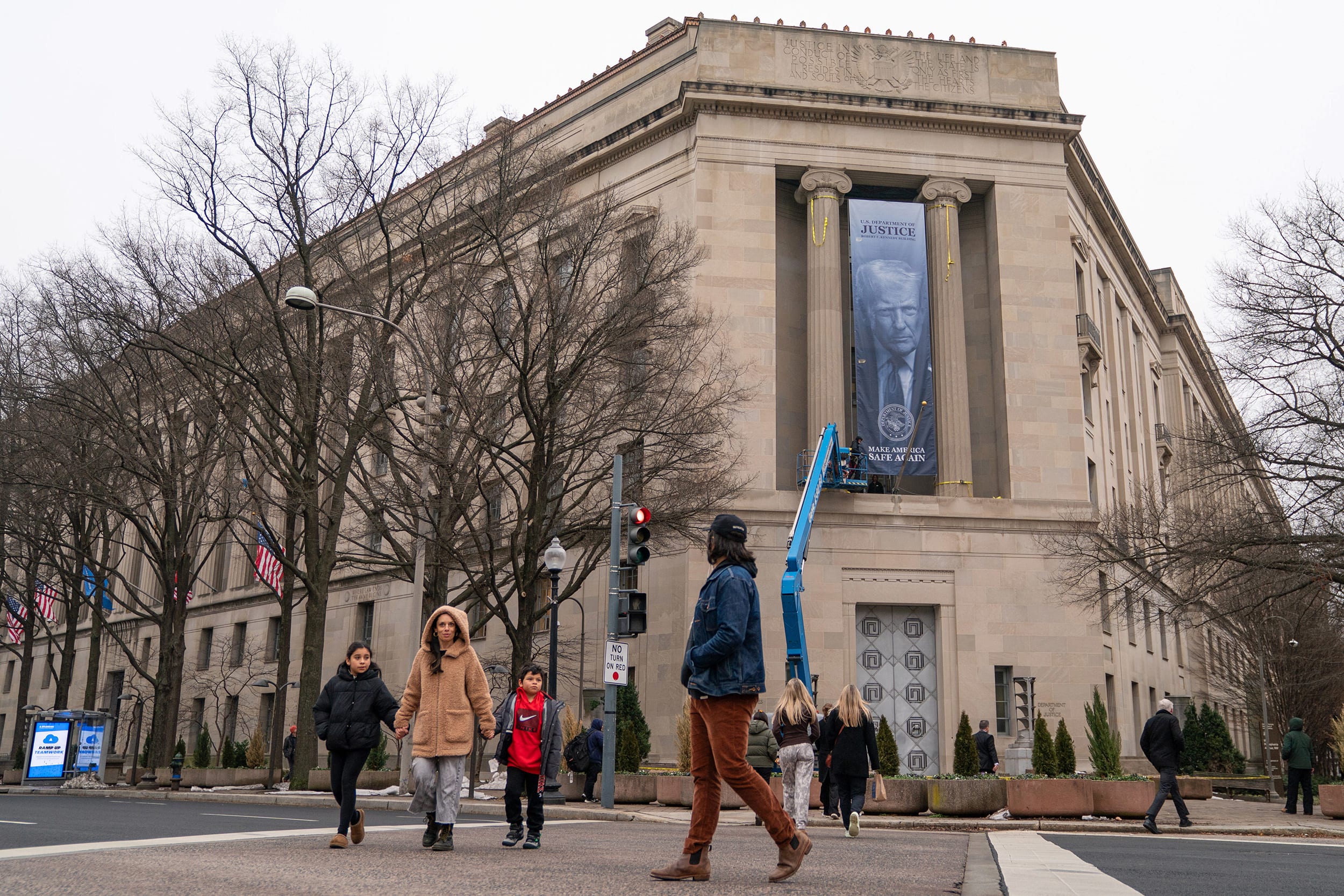 Giant Trump banner hung on Justice Department headquarters