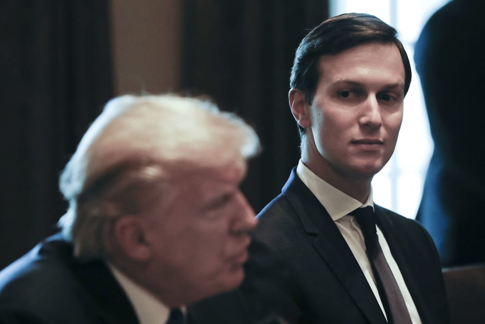 Image: White House Senior Adviser and envoy, Jared Kushner, listens as President Donald Trump speaks during a meeting in the Cabinet Room of the White House