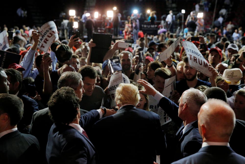Image: U.S. Republican presidential candidate Donald Trump greets audience members at a campaign rally in Bangor