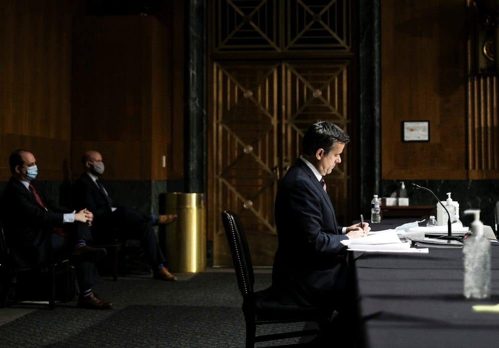 Image: U.S. Rep. John Ratcliffe finishes testifying before a Senate Intelligence Committee nomination hearing on Capitol Hill in Washington