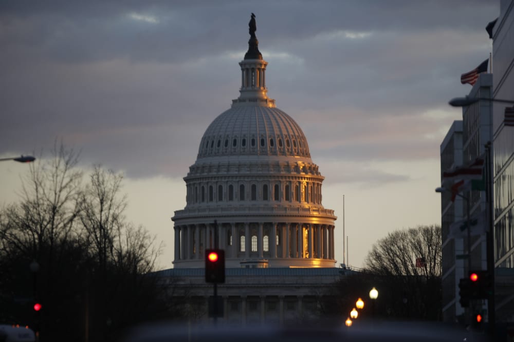 The dome of the U.S. Capitol Building is seen as the sun sets on Capitol Hill in Washington, Thursday, March 7, 2013. (AP Photo/Charles Dharapak)