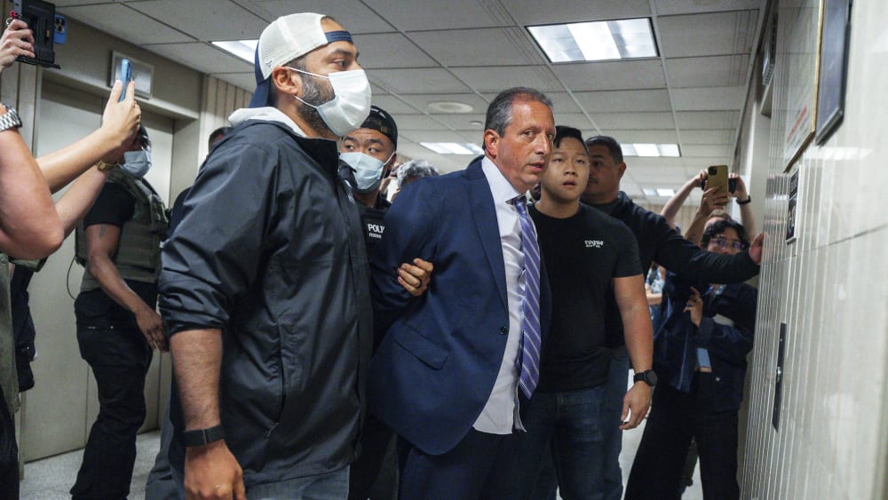 Brad Lander under arrest by Immigration and Customs Enforcement (ICE) and FBI agents outside federal immigration court.