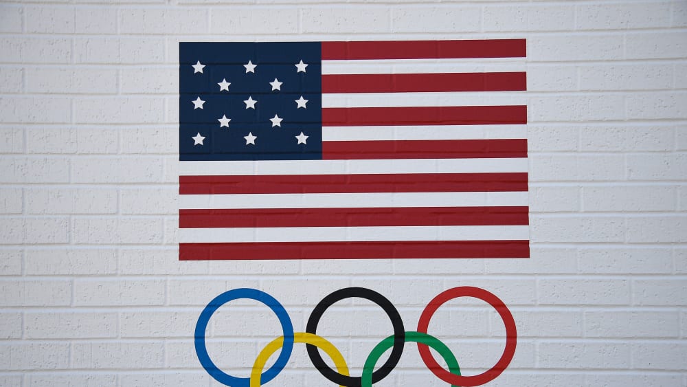 USOC logo showing a U.S. flag and the Olympic ring.