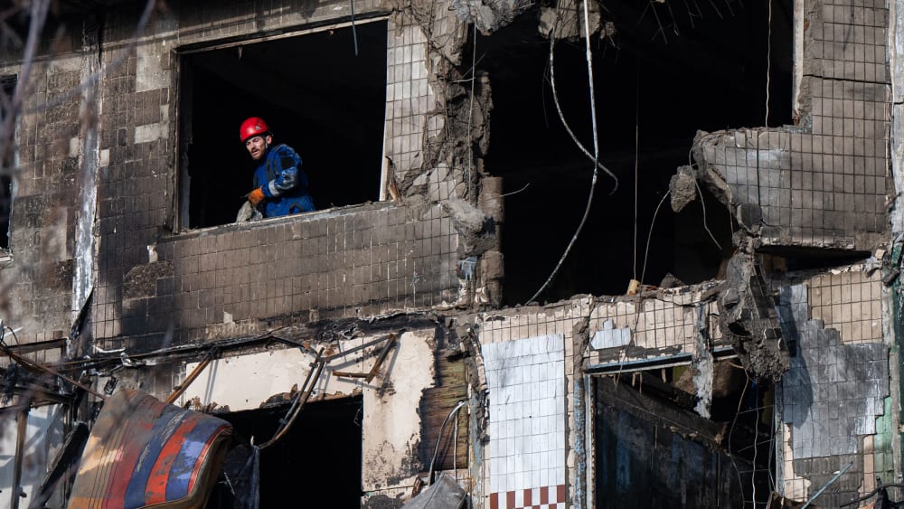 First responders operate at one of the buildings damaged by Russia's drone attack in Kyiv, Ukraine.