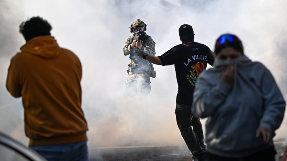 Residents and protesters clash with federal agents in Chicago.