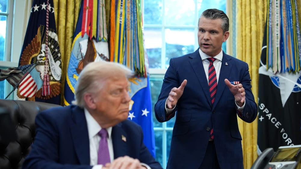 U.S. Defense Secretary Pete Hegseth and U.S. President Donald Trump in the Oval Office of the White House.