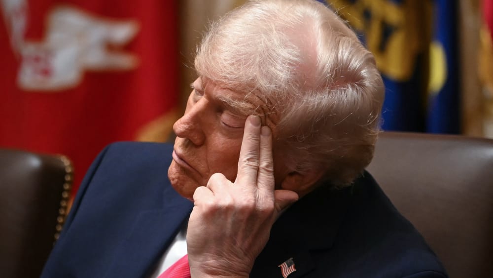 President Donald Trump looks on during a Cabinet meeting in the White House on Dec. 2, 2025.