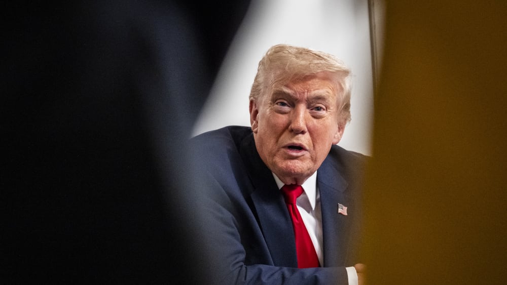 President Donald Trump participates in a call with U.S. service members from his Mar-a-Lago club on Thanksgiving Day on Nov. 27, 2025, in Palm Beach, Florida.
