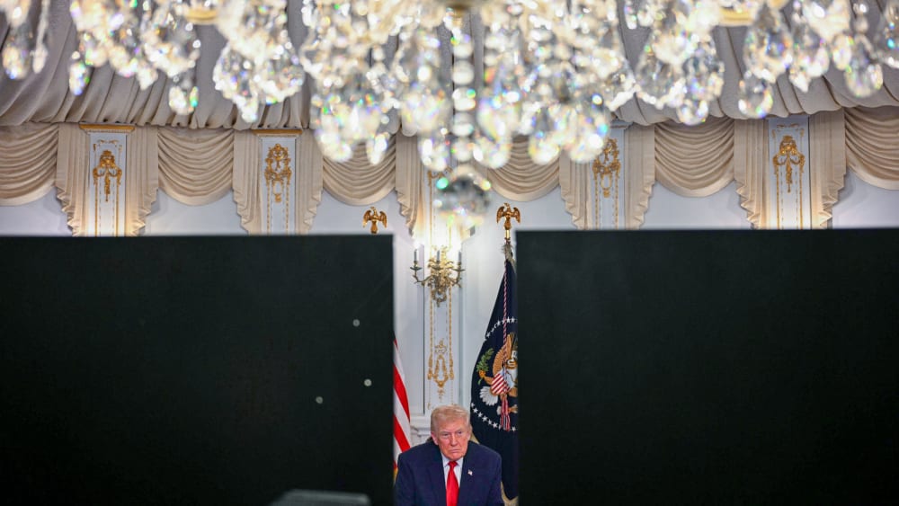 President Donald Trump participates in a video call with military service members from his Mar-a-Lago residence in Palm Beach, Florida, on Nov.27, 2025.