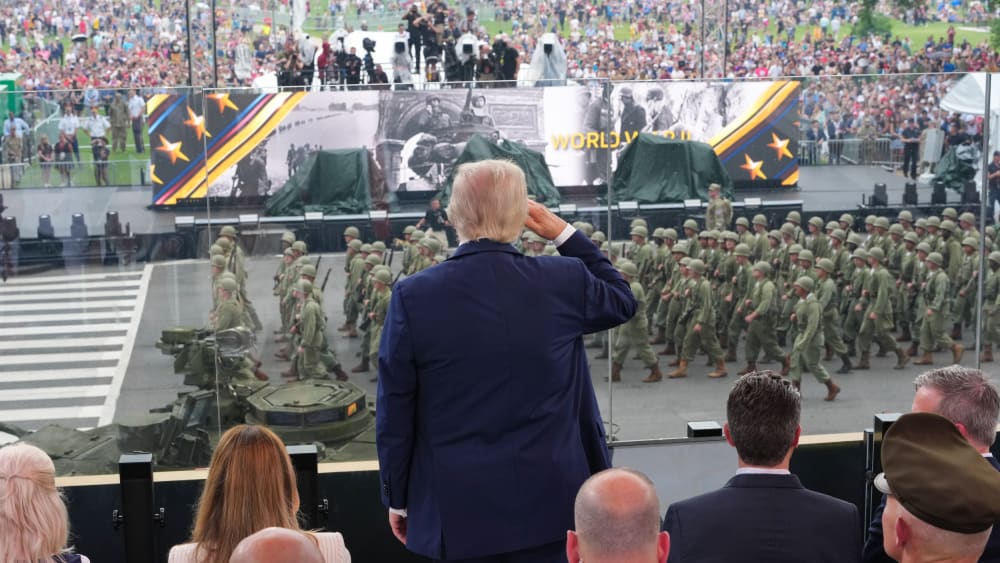 President Donald Trump salutes Army troops on the National Mall.