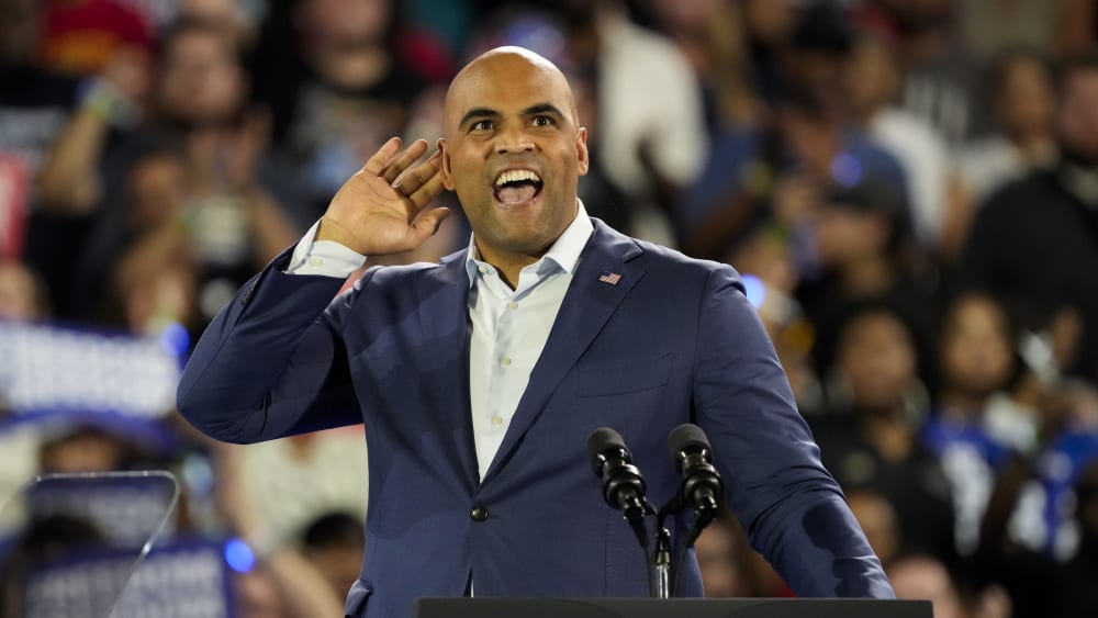 Colin Allred listens to the crowd during his speech at a Vice President Kamala Harris rally
