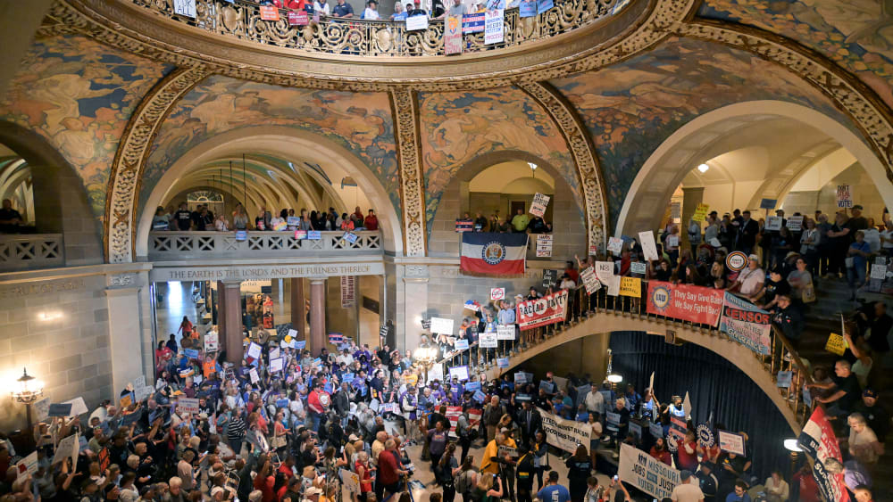 Protestors demonstrate inside the rotunda of the Missouri Capitol Building in Jefferson City, M.O.