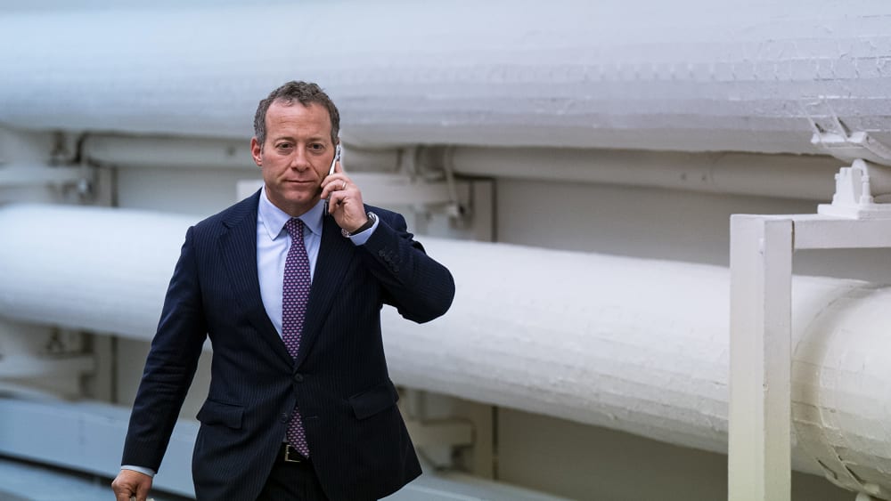 Representative Josh Gottheimer talks on his phone before a meeting on Capitol Hill in on Dec. 6, 2022.