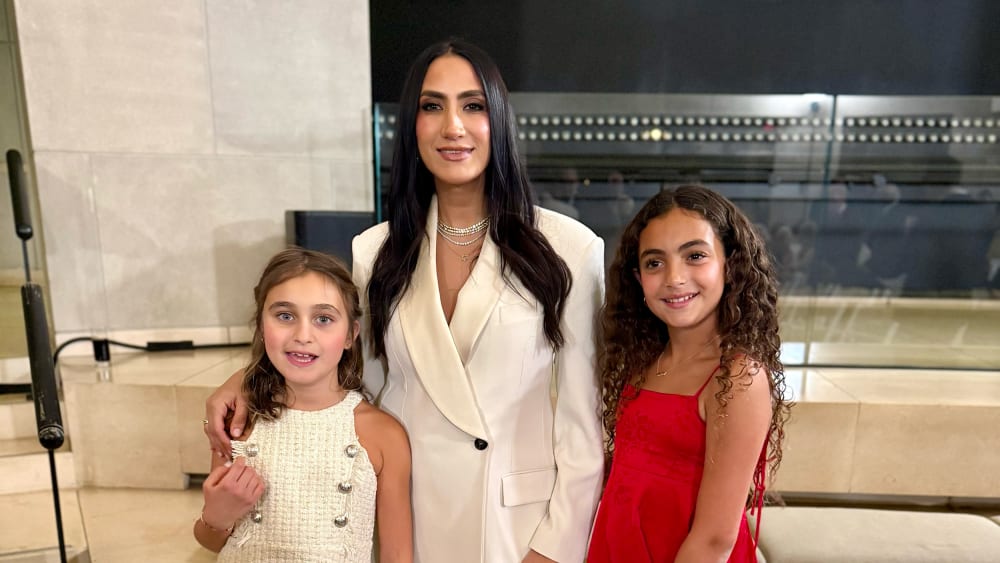 Mandana Dayani poses with her daughters after being sworn in as a trustee to the U.S. Holocaust Memorial Council on Dec. 8.