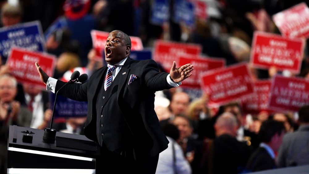 Pastor Mark Burns gestures as he delivers a speech at the Republican National Convention in Cleveland, O.H., on July 21, 2016.
