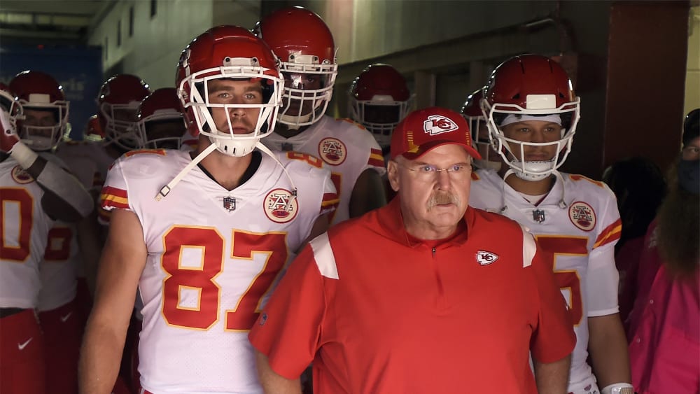 Head Coach Andy Reid, Travis Kelce #87 and Patrick Mahomes #15 of the Kansas City Chiefs look on before taking the field against the Washington Football Team.