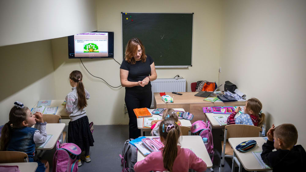 First-year students sit in class at an underground school equipped as a bomb shelter in Voznesenske, Chernihiv Region, Ukraine, on Sept. 15, 2025.