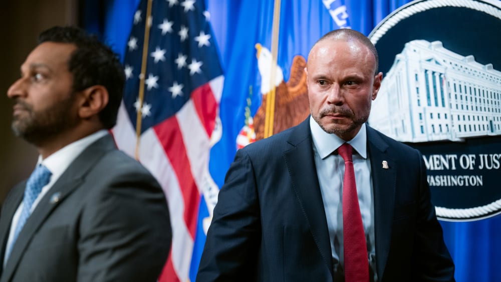 FBI Director Kash Patel, left, and Deputy Director of the FBI Dan Bongino conduct a news conference at the Department of Justice.