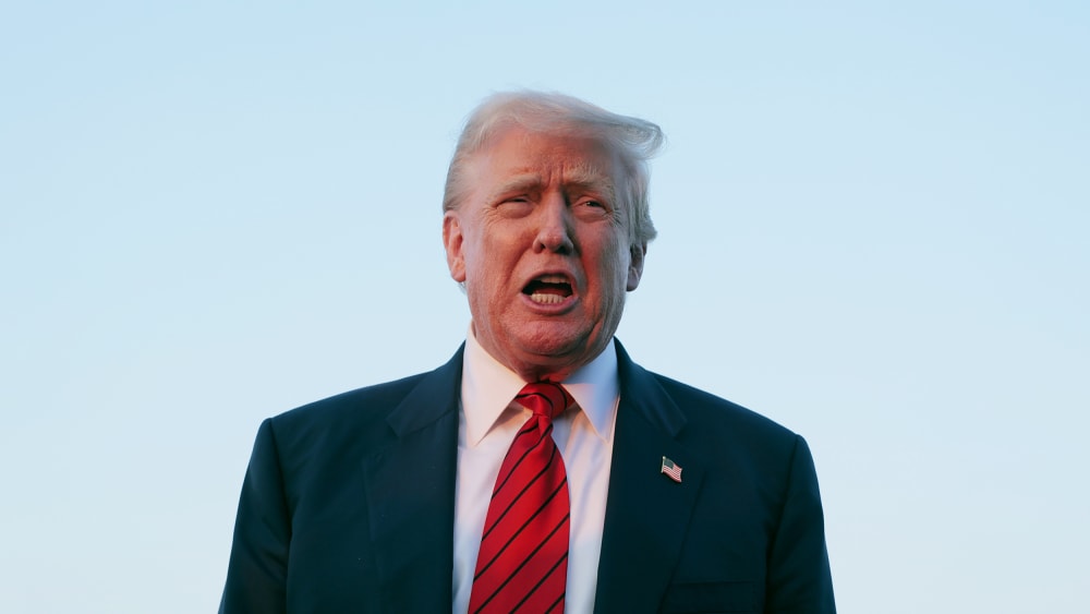 U.S. President Donald Trump speaks to reporters near Air Force One on Aug. 03, 2025 in Allentown, PA.