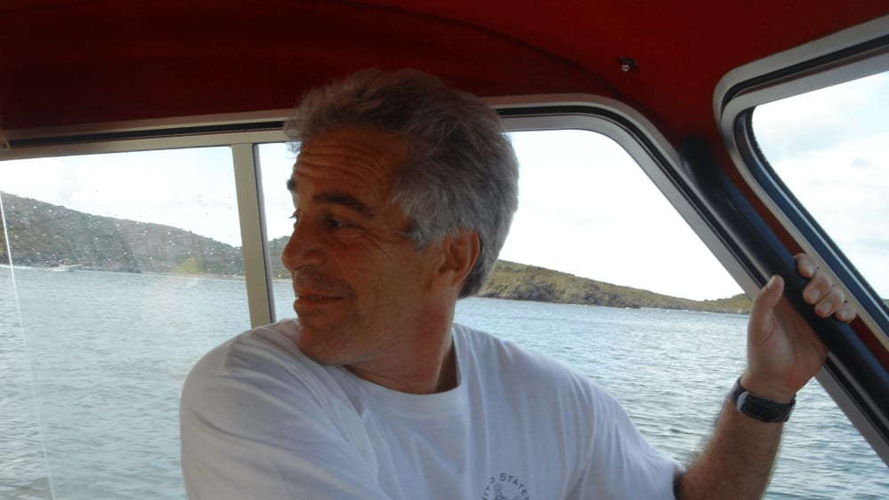Jeffrey Epstein looking back on a boat.