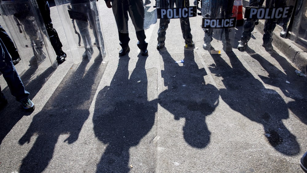 Police gather at North Ave and Pennsylvania Ave in Baltimore, Md., April 28, 2015. (Photo by Eric Thayer/Reuters)