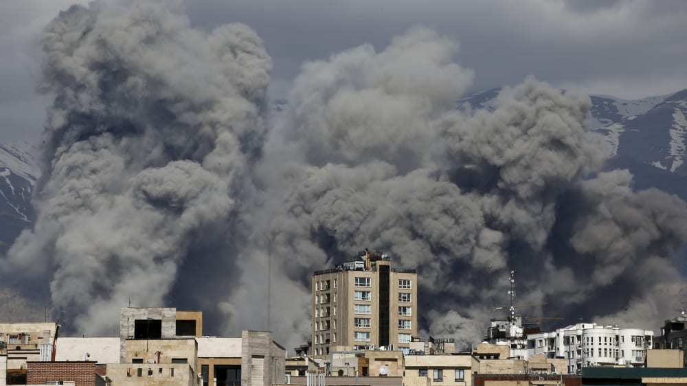 Smoke rises over Tehran, Iran, after a series of explosions on March 01, 2026.
