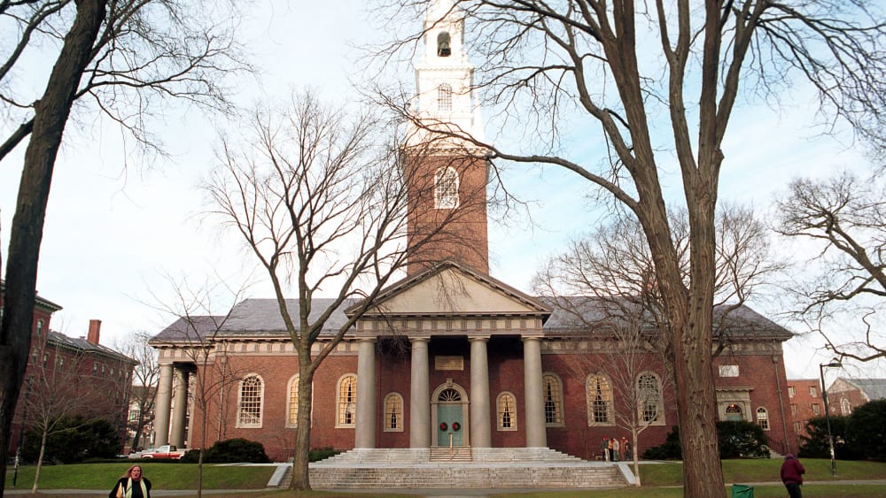 People walk around the Harvard University''s main campus.