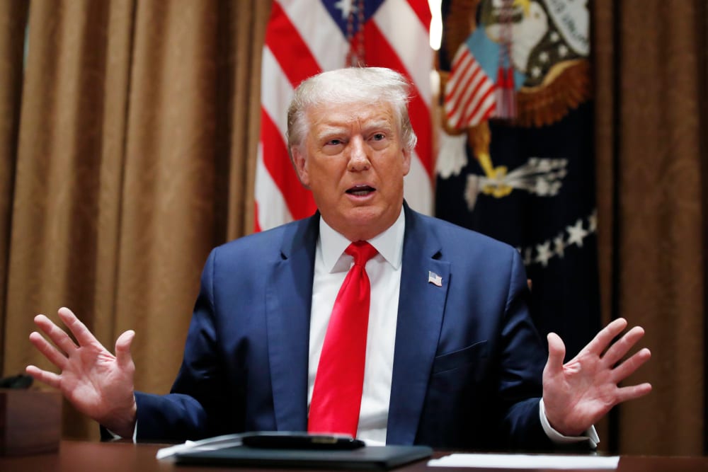 President Donald Trump speaks during a meeting at the White House on Aug. 3, 2020.
