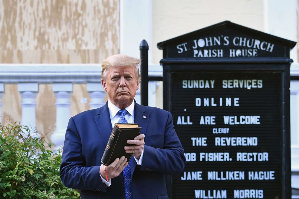 Image: President Donald Trump holds up a Bible outside of St John's Episcopal church across Lafayette Park in Washington, DC