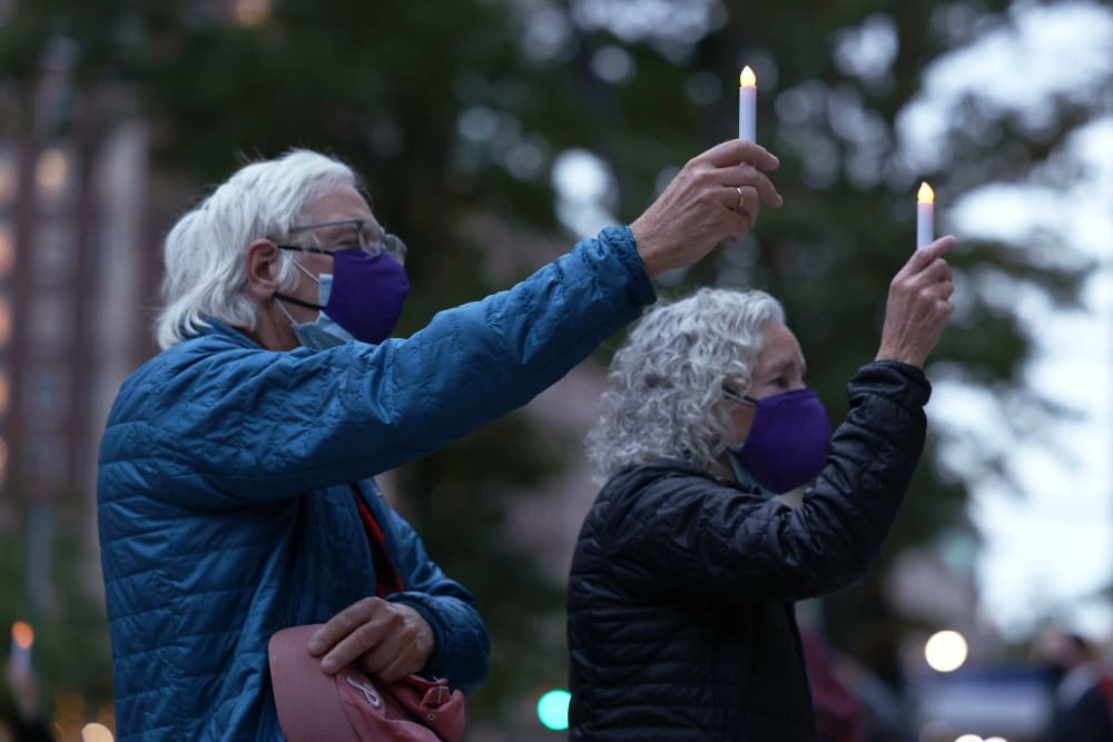 Image: Candlelight Procession Held To Remember Lives Affected By Coronavirus