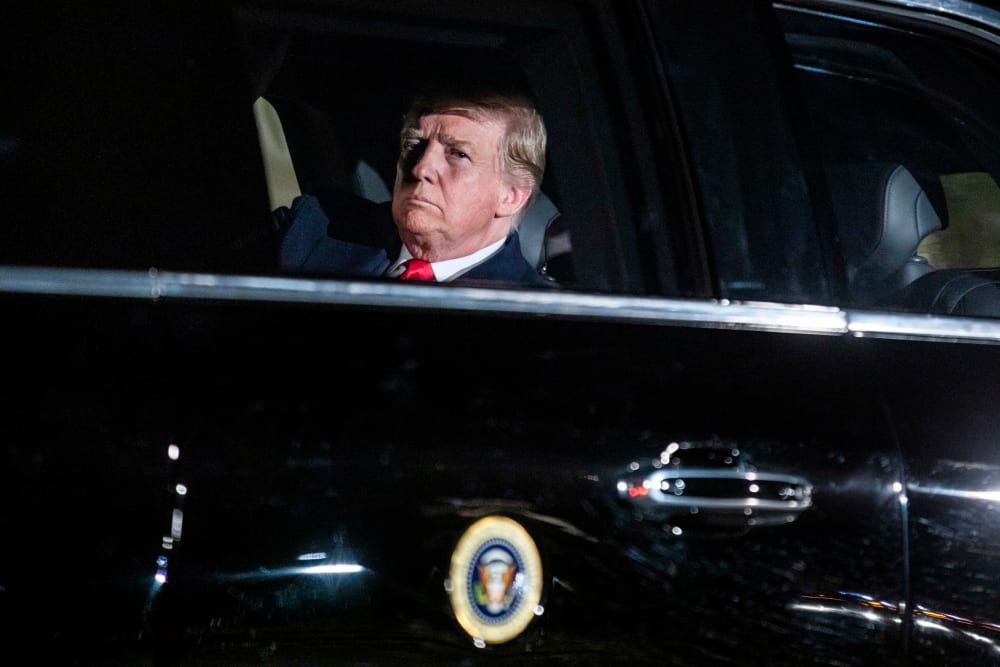 Image: President Donald Trump rides in the presidential limo to deliver his State of the Union at the Capitol on Feb. 5, 2019.