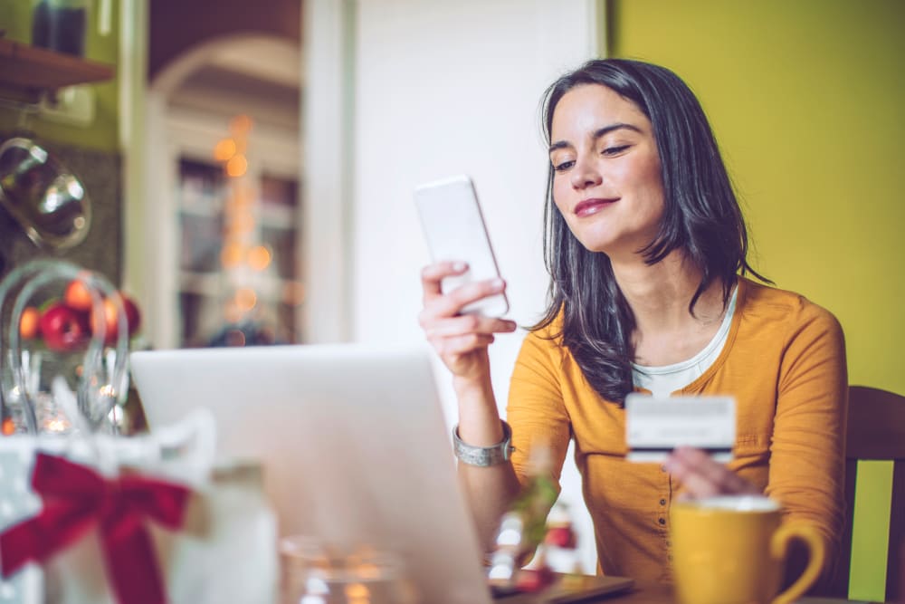 Image: Young Woman Shops At Home