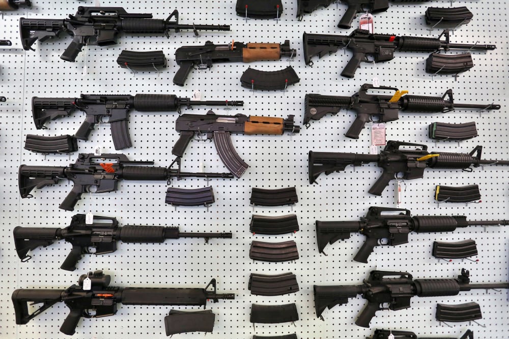 Image: Guns are displayed for sale at Dragonman's, an arms seller east of Colorado Springs