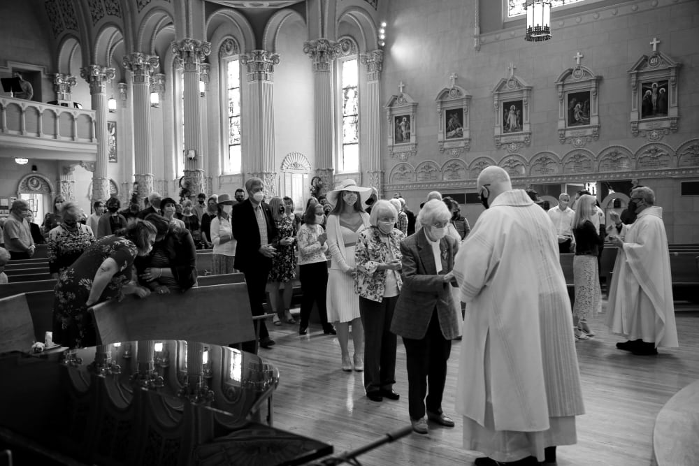 Image: Worshippers at an Easter Sunday service at St. James Catholic Church in Louisville, Ky., on April 4, 2021.