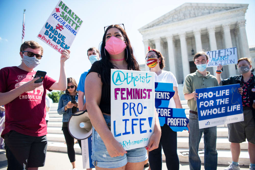 Anti-abortion demonstrators protest in front of the Supreme Court on June 29, 2020.