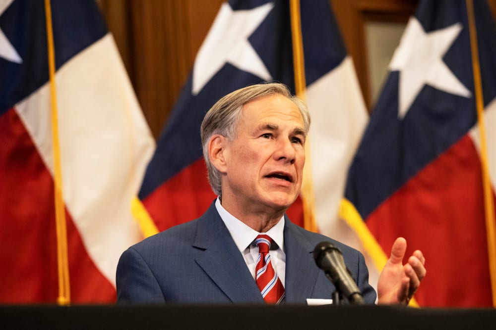 Texas Gov. Greg Abbott announces the reopening of more Texas businesses in Austin on May 18, 2020.