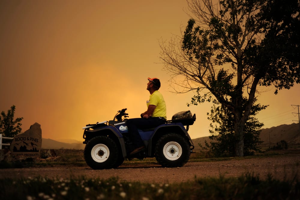 Lon Boehmer watches as the High Park fire burns west of Fort Collins and Loveland on June 10, 2012.