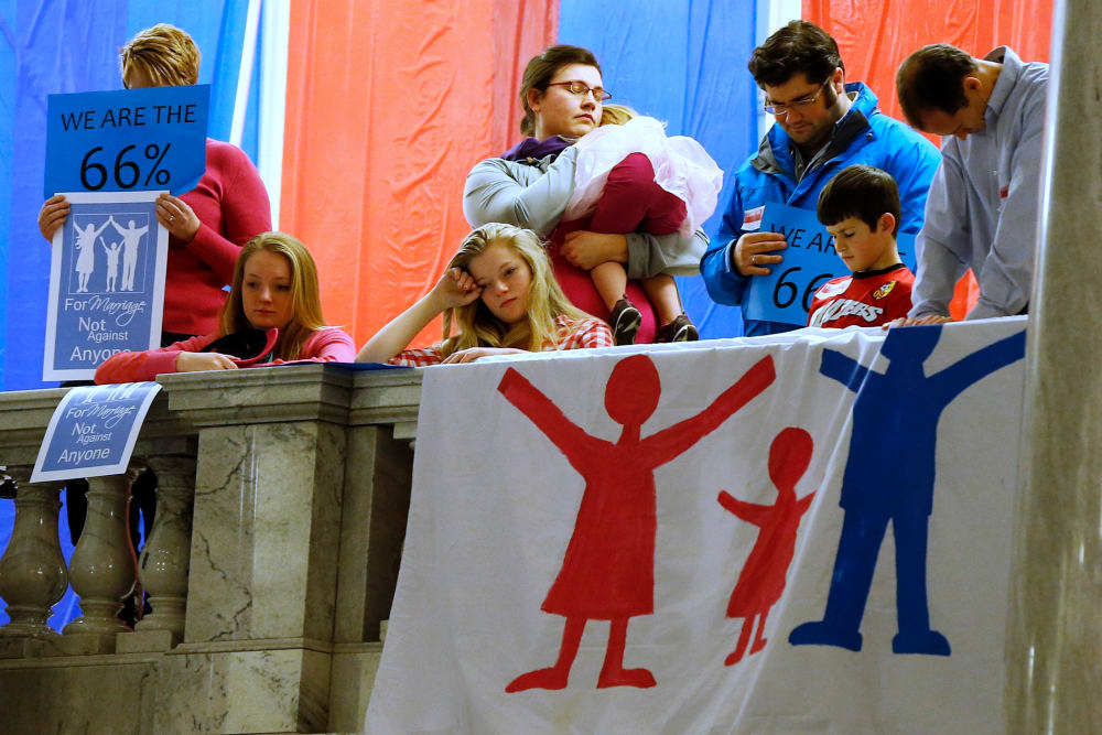 Demonstrators hold an anti-gay marriage rally inside the Utah State Capitol on Jan. 28, 2014.