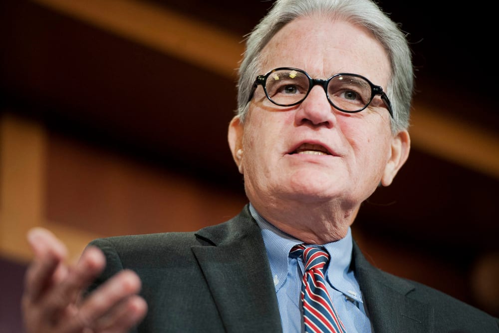 Sen. Tom Coburn, conducts a news conference in the Capitol on Dec. 9, 2014. (Photo by Tom Williams/CQ Roll Call/AP)