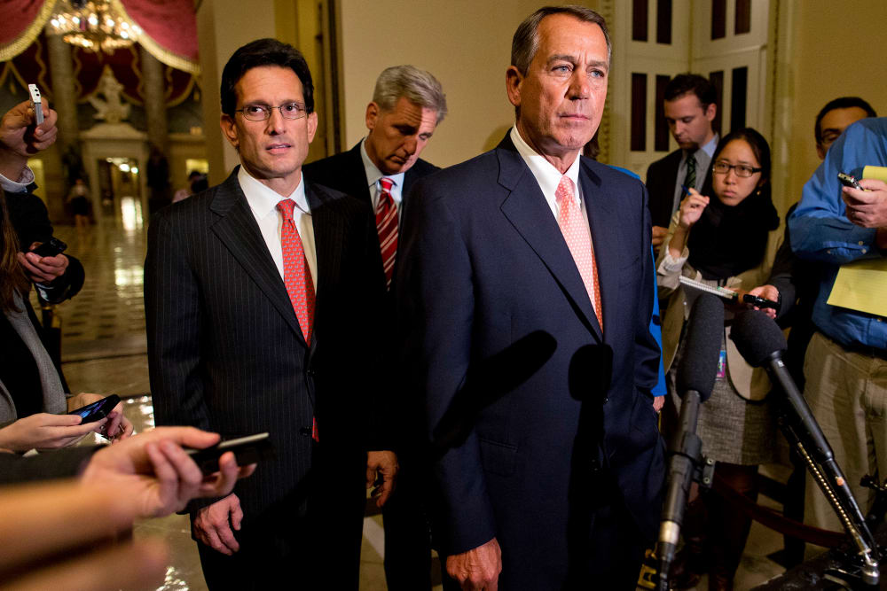 House Majority Leader Rep. Eric Cantor, R-Va., left, looks on as Speaker of the House Rep. John Boehner, R-Ohio, pauses during a news conference on Capitol Hill on Oct. 1, 2013 in Washington.