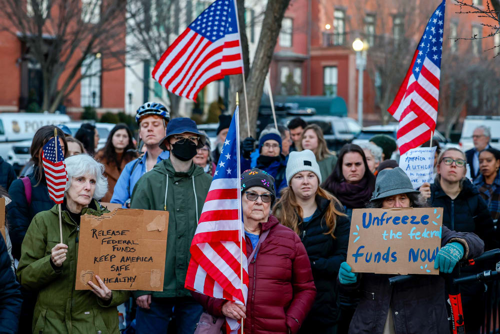 Activists hold rally outside White House.