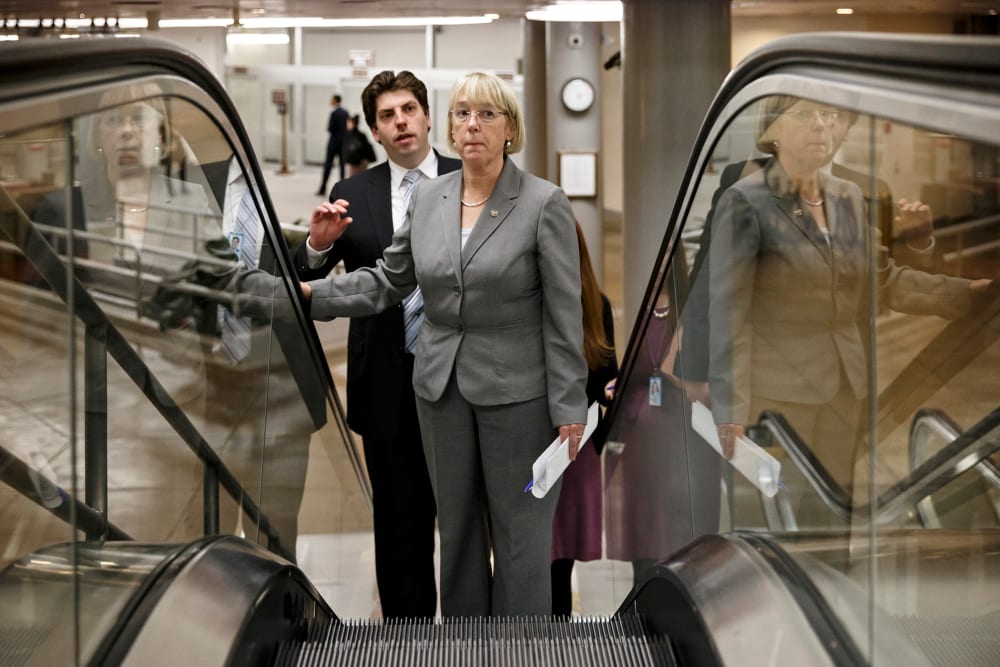 Senate Budget Committee Chairwoman Patty Murray, D-Wash., who negotiated a bipartisan budget compromise with Rep. Paul Ryan, R-Wis., the House Budget Committee chairman, takes an escalator to the Senate for votes on nominations late Dec. 16, 2013, at the
