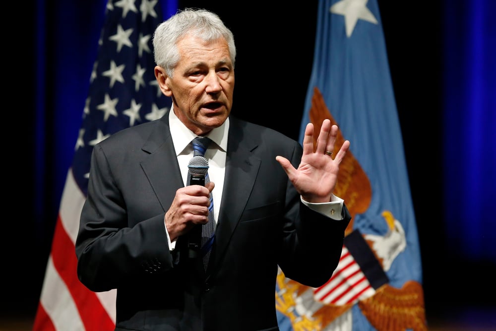 Secretary of Defense Chuck Hagel speaks to service members and civilian employees on his first day in his new post after being sworn in, at the Pentagon on February 27, 2013. (Photo by Jonathan Ernst/Reuters)