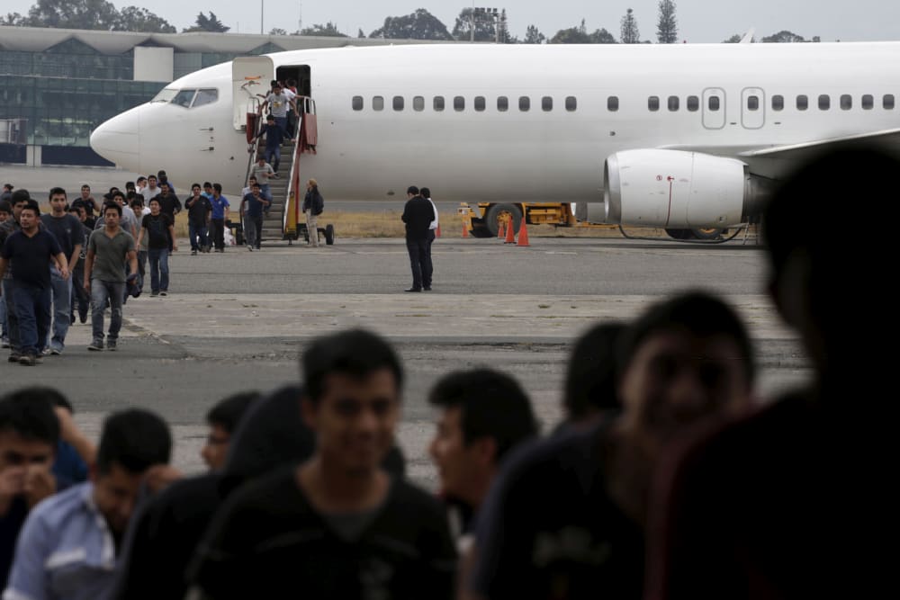 Illegal migrants from Guatemala, deported from the US, arrive at an air force base, Guatemala City, March 19, 2015. The flight carrying some 150 illegal migrants was part of a five day operation that deported thousands. (Photo by Jorge Dan Lopez/Reuters)