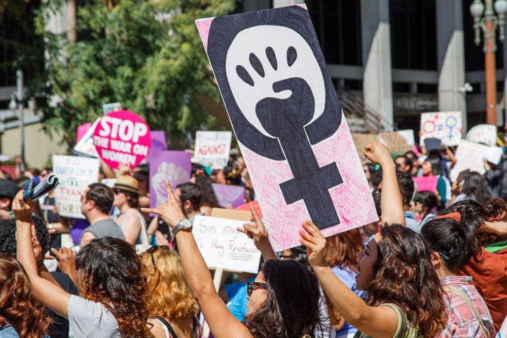 Protesters attend a march for equal rights and justice to mark International Women's Day, in downtown Los Angeles, Calif. on March 8, 2015. (Photo by Eugene Garcia/EPA)