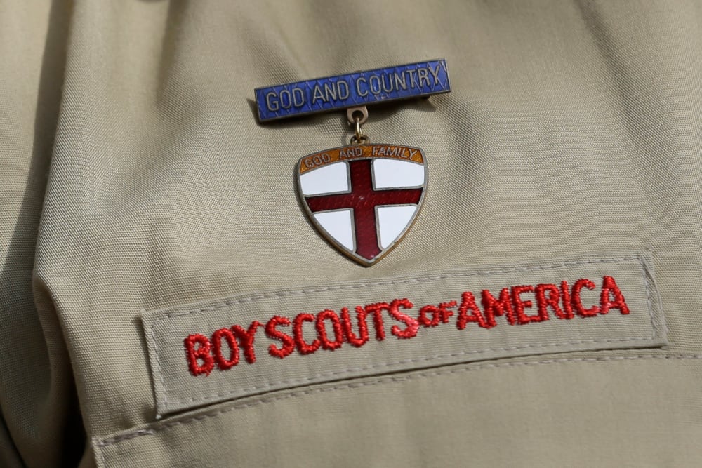 This photo taken Monday, Feb. 4, 2013, shows a close up detail of a Boy Scout uniform in Irving, Texas. (Photo by Tony Gutierrez/AP)